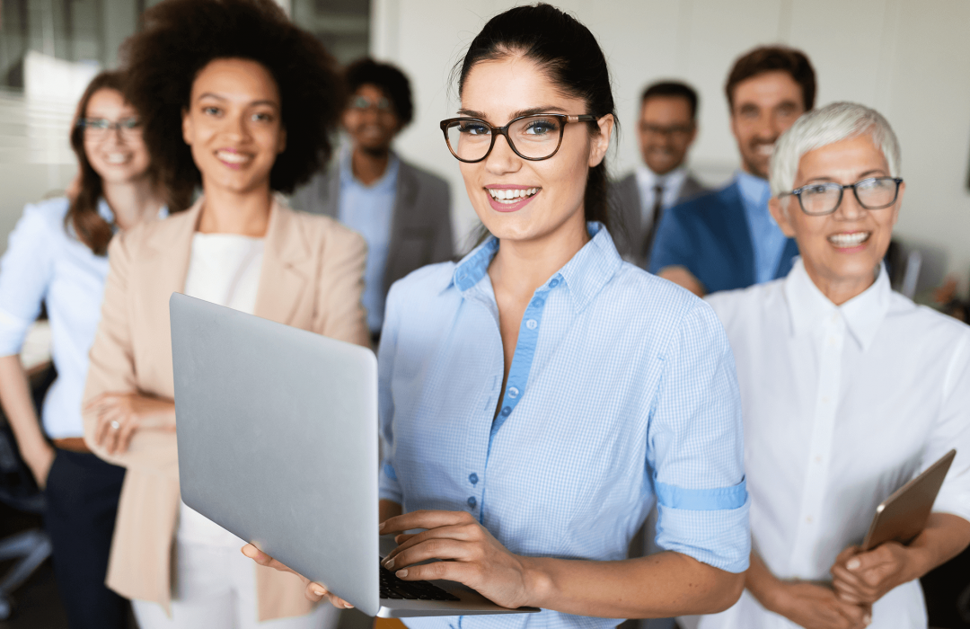 portrait-of-business-team-posing-in-office-NLFAGE9.png